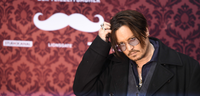 US actor Johnny Depp poses on the red carpet for the film "Mortdecai" in Berlin January 18, 2015. The film starts in German cinemas on January 22, 2015. AFP PHOTO / TOBIAS SCHWARZ (Photo credit should read TOBIAS SCHWARZ/AFP/Getty Images)