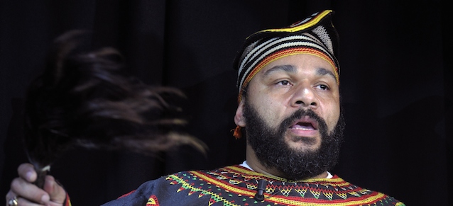 French controversial humorist Dieudonne M'bala M'bala holds a fly-whisk as he gives a press conference in the Theatre de la Main d'or in Paris on January 11, 2014, saying that there is "no more Dieudonne affair" since he renounced to his forbidden show named "The Wall" (Le mur) in favor of a new one-man show named "Asu Zoa". Dieudonne sought to defy a ban on his shows over their "anti-Semitic" slant, announcing four performances in Paris on January 11, 2014 despite a police decree in the capital against them, following the cancellation by French court of shows last days in three other towns. Dieudonne has been fined several times for defamation, using insulting language, hate speech and racial discrimination. AFP PHOTO / ALAIN JOCARD