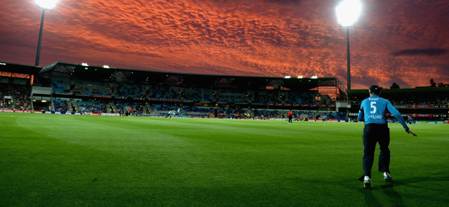 HOBART, AUSTRALIA - JANUARY 23: Joe Root of England fields on the boundary as the sunsets during the One Day International Tri Series match between Australia and England at Blundstone Arena on January 23, 2015 in Hobart, Australia. (Photo by Gareth Copley/Getty Images)