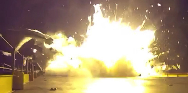 This Jan. 10, 2015 image from video provided by SpaceX shows its booster rocket trying to land on a floating barge in the Atlantic after launch, in an unprecedented attempt that ended in a fiery explosion. The video released Friday, Jan. 16, 2015 shows the rocket hitting the football field-sized barge a couple hundred miles off Florida's northeastern coast. The landing attempt came minutes after separation from the main rocket that successfully delivered groceries and science experiments to the International Space Station. (AP Photo/SpaceX)