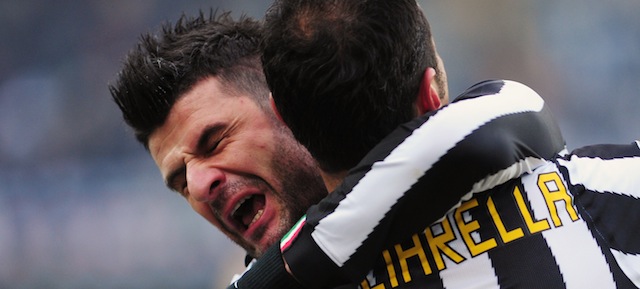 Juventus' forward Fabio Quagliarella (front) is embraced by Juventus' forward Vincenzo Iaquinta (back) as they celebrate after scoring during Italian serie A football match between Chievo and Juventus, on December 19 2010, at Marc'Antonio Bentegodi stadium in Verona. AFP PHOTO / ALBERTO PIZZOLI (Photo credit should read ALBERTO PIZZOLI/AFP/Getty Images)