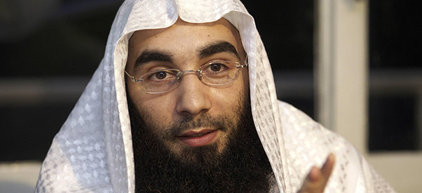 Radical Islamist organization 'Sharia4Belgium' spokesman Fouad Belkacem alias Abu Imran speaks during a press conference dedicated to the case of Stephanie Djato, a woman who was arrested yesterday for wearing a niqab and assaulting a police officer, in Sint-Jans-Molenbeek (Molenbeek-Saint-Jean), in Brussels, on June 1, 2012. On May 31 small riots broke out in Molenbeek, after the woman, wearing a niqab (veil that completely covers the face) was checked by two police officers and asked to take off her full veil, which has been illegal in Belgium for over a year. The woman was brought to a police station after her refusal to comply and she allegedly assaulted two female police officers once there, leading to tensions in the local community. AFP PHOTO / BELGA / NICOLAS MAETERLINCK ***Belgium Out*** (Photo credit should read NICOLAS MAETERLINCK/AFP/GettyImages)