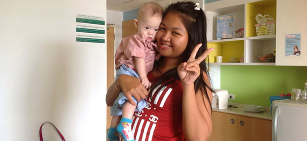 SRIRACHA , THAILAND - AUGUST 6: In this handout photo Thai surrogate mother Pattaramon Chanbua poses with baby Gammy at the Samitivej Hospital on August 6, 2014 in Chonburi province in Bangkok, Thailand. David and Wendy Farnell have made international headlines for abandoning their disabled infant son, Gammy, in Thailand with his surrogate mother, Pattaramon Chanbua. Gammy's twin sister lives with the Farnells at their home in Bunbury, Western Australia. The couple have denied abandoning their son on a recent television interview in Australia. (Handout photo via Getty Images)