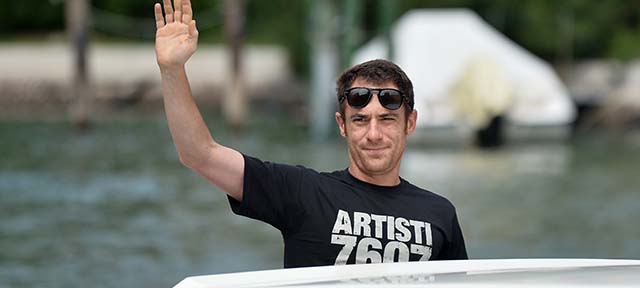 Italian actor Elio Germano arrives on a taxi boat at the Hotel Excelsior during the 71st Venice Film Festival on August 31, 2014 at Venice Lido. AFP PHOTO / TIZIANA FABI (Photo credit should read TIZIANA FABI/AFP/Getty Images)