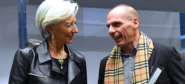 Greek Finance Minister Yanis Varoufakis (R) speaks with International Monetary Fund (IMF) Director Christine Lagarde during an emergency Eurogroup finance ministers meeting at the European Council in Brussels on February 11, 2015. Proposals by the new government in Athens to renegotiate the terms of its massive international bailout are scheduled to be discussed by eurozone finance ministers in Brussels on February 11 and 12. AFP PHOTO / EMMANUEL DUNAND (Photo credit should read EMMANUEL DUNAND/AFP/Getty Images)