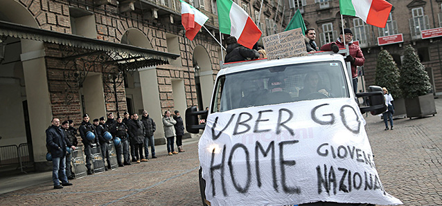 ItalianTaxi drivers demonstrate against minicabs and the Taxi app offered by Uber, UberPOP, which they consider being unfair competition, on February 17, 2015 in Turin. AFP PHOTO / MARCO BERTORELLO (Photo credit should read MARCO BERTORELLO/AFP/Getty Images)