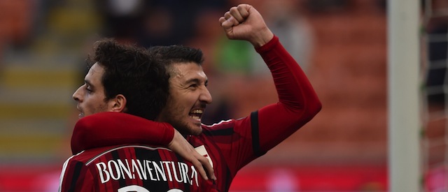 MILAN, ITALY - FEBRUARY 22: Giacomo Bonaventura (L) of AC Milan celebrates after scoring the opening goal with team mate Salvatore Bocchetti during the Serie A match between AC Milan and AC Cesena at Stadio Giuseppe Meazza on February 22, 2015 in Milan, Italy. (Photo by Valerio Pennicino/Getty Images)