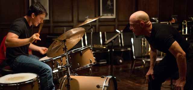 This image released by Sony Pictures Classics shows Miles Teller, left, and J.K. Simmons in a scene from "Whiplash." (AP Photo/Sony Pictures Classics, Daniel McFadden)