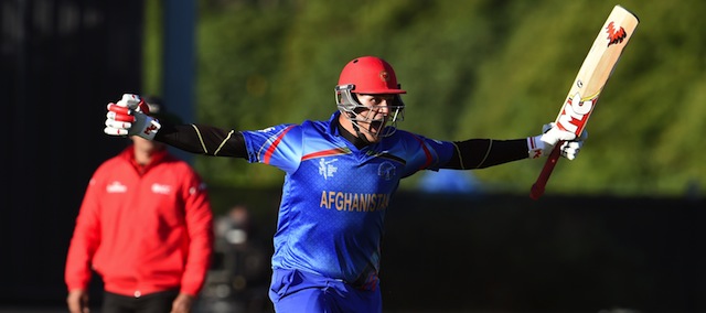 Afghanistan batsman Hamid Hassan celebrates as the winning runs are hit against Scotland in their 2015 Cricket World Cup Group A match in Dunedin on February 26, 2015. AFP PHOTO / William WEST (Photo credit should read WILLIAM WEST/AFP/Getty Images)