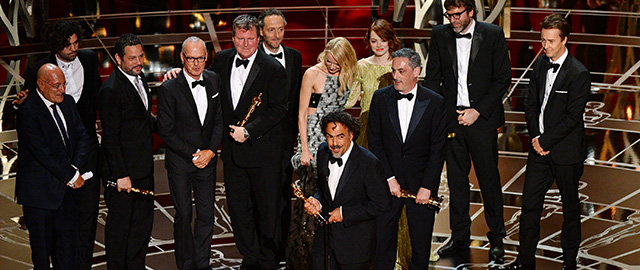 Winners for Best Picture "Birdman," Alejandro G. IÃ±Ã¡rritu (C), John Lesher and James W. Skotchdopole and cast celebrate on stage at the 87th Oscars February 22, 2015 in Hollywood, California. AFP PHOTO / Robyn BECK (Photo credit should read ROBYN BECK/AFP/Getty Images)