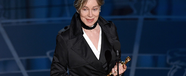 Milena Canonero accepts the award for best costume design for “The Grand Budapest Hotel” at the Oscars on Sunday, Feb. 22, 2015, at the Dolby Theatre in Los Angeles. (Photo by John Shearer/Invision/AP)