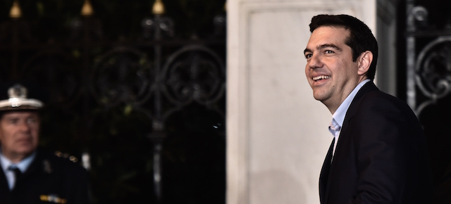 Newly appointed Greek Prime Minister Alexis Tsipras leaves the Presidential Palace in Athens on January 27, 2015. Greece named radical left-wing economist Yanis Varoufakis as its new finance minister, giving him the mammoth task of leading negotiations with international creditors over the country's bailout. The appointment of Varoufakis is seen as a signal that the new anti-austerity Syriza-led government will take a hard line in haggling over the 240-billion-euro ($269 billion) EU-IMF package. AFP PHOTO / ARIS MESSINIS (Photo credit should read ARIS MESSINIS/AFP/Getty Images)