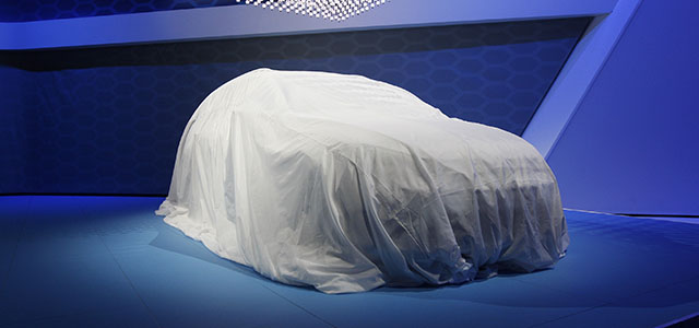 LOS ANGELES, CA - NOVEMBER 19: The Volkswagen Golf SportWagen HyMotion stands under veil before its debut at the 2014 Los Angeles Auto Show on November 19, 2014 in Los Angeles, California. This year's show is slated to have a record 25 world auto debuts with at least 30 others having North American debuts. (Photo by David McNew/Getty Images)