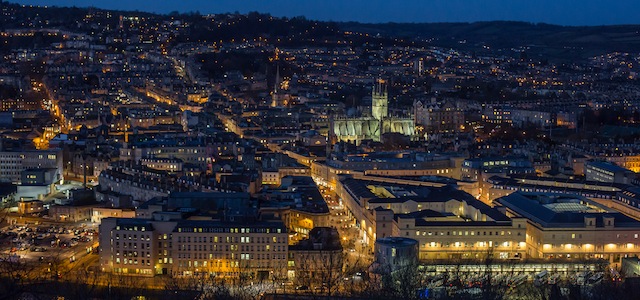BATH, ENGLAND - JANUARY 16: Street lighting illuminates property in the historic city centre on January 16, 2015 in Bath, England. Although house prices are among the highest in the UK the average earnings, are in contrast, among the lowest in England and with the average house price now rising to ¬£300,000, it means that house prices are on average ten times annual incomes. Along with health and the economy, perceived inequalities in wealth are likely to be a key election issue. (Photo by Matt Cardy/Getty Images)
