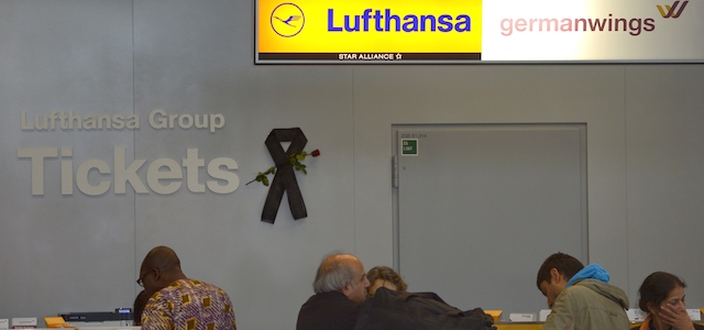 A black mourning band is seen at a ticket counter of German airline Lufthansa at the Duesseldorf airport on March 31, 2015 in Duesseldorf, western Germany. Germany will hold a national memorial ceremony and service for victims of a Germanwings flight that crashed in the French Alps, killing all 150 aboard, on April 17, regional authorities said. AFP PHOTO / SASCHA SCHUERMANN (Photo credit should read SASCHA SCHUERMANN/AFP/Getty Images)