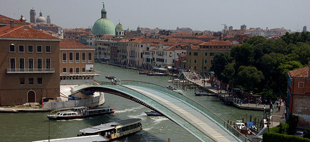 Photo shows a view of the Calatrava bridge over the Grand Canal in Venice on August 27, 2008. Spanish architect Santiago Calatrava defended on September 3, his controversial new bridge over Venice's Grand Canal, saying in an interview that he regretted that it will no longer have a grand opening. "This is my most beautiful bridge. I regret that the workers, who worked so hard on it, will not have an adequate inauguration," he told top-selling daily newspaper El Pais. "They worked to give Venice a work which is worthy of Venice. It is an act of love to Venice and of love to Italian civilization in general," he added. The bridge, a single arching span of steel and glass, was to have been opened on September 18 by Italian President Napolitano. But on September 1, Venice mayor Massimo Cacciari canceled the grand inauguration of the bridge due to fierce criticisms that it was unnecessary, unsuitable and four times over budget. It will now be opened with a simple toast. AFP PHOTO/ Sebastiano Casellati (Photo credit should read SEBASTIANO CASELLATI/AFP/Getty Images)