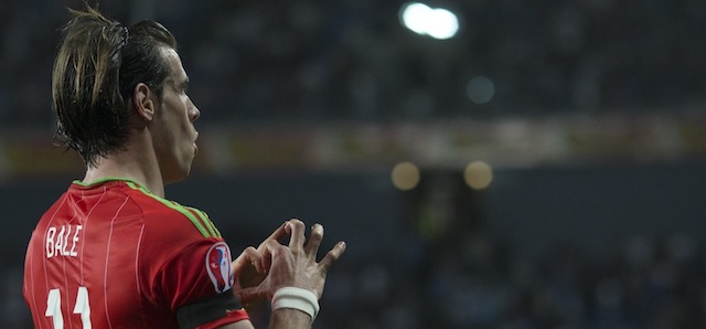 Wales' Gareth Bale celebrates his second goal against Israel during Euro 2016 group B qualifying soccer match in Haifa, Israel, Saturday, March 28, 2015. (AP Photo/Ariel Schalit)