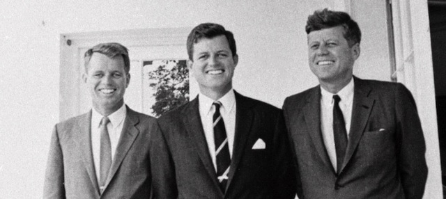 FILE - In this August 23, 1963 file photo, Sen. Edward M. Kennedy, center, poses with his brothers U. S. Attorney General Robert F. Kennedy, left, and President John F. Kennedy at the White House in Washington. (AP Photo, File)