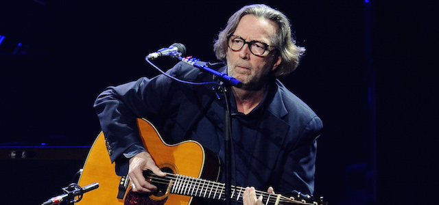 FILE - In this Feb. 18, 2010 file photo, Eric Clapton performs in concert at Madison Square Garden in New York. Clapton is paying tribute to his late friend and collaborator J.J. Cale with a new album. Tom Petty, Willie Nelson, John Mayer and others lend a hand on "The Breeze: An Appreciation of J.J. Cale," due out July 29. The album includes 16 Cale songs reimagined by Clapton and the all-star group of friends. Cale, architect of the Tulsa Sound and a widely influential figure in rock 'n' roll history, died last year at 74. (AP Photo/Evan Agostini)