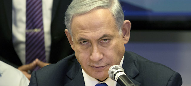 Israeli Prime Minister Benjamin Netanyahu attends a Likud party meeting in Or Yehuda near Tel Aviv, Israel, Monday, March 16, 2015 a day ahead of legislative elections. Netanyahu is seeking his fourth term as prime minister. (AP Photo/Ariel Schalit)