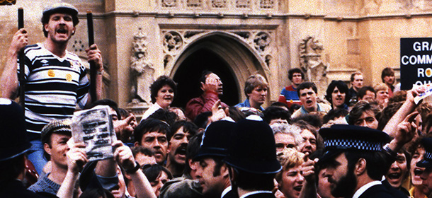 Striking mineworkers protest outside the Houses of Parliament in London, England on June 7, 1984 during a mass lobby of Members of Parliament. Large police reinforcements were drafted in. Several men were arrested. (AP Photo/Joseph Schaber)