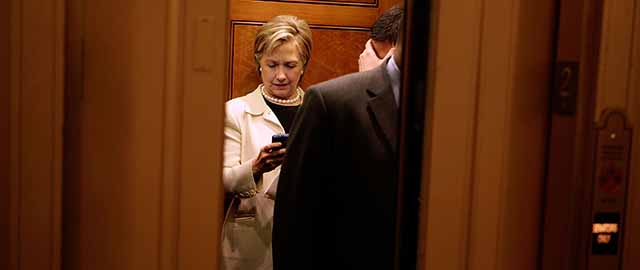 WASHINGTON - JANUARY 07: Secretary of State-designate and U.S. Senator Hillary Clinton (D-NY) looks at her BlackBerry while on an elevator at the U.S. Capitol January 7, 2009 in Washington, DC. Senate Democratic leadership said it will work to find a way for Roland Burris to be sworn in as a senator from Illinois to fill the seat vacated by President-elect Barack Obama. Burris' appointment has been held up by the Illinois secretary of state because it was made by Gov. Rod Blagojevich who is being investigated for alleged corruption related to the appointment. (Photo by Chip Somodevilla/Getty Images) *** Local Caption *** Hillary Clinton