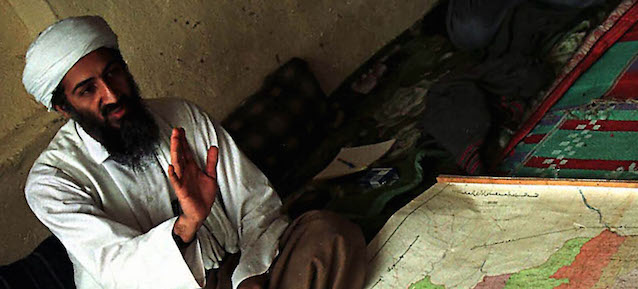 FILE--Exiled Saudi dissident Osama bin Laden is shown in Afghanistan in this April 1998 file photo. Four followers of bin Laden were convicted Tuesday, May 29, 2001, in New York, of charges in the nearly simultaneous 1998 bombings of two U.S. embassies in Africa that killed 224 people and buried thousands of others under piles of tangled metal and concrete. (AP Photo/File)