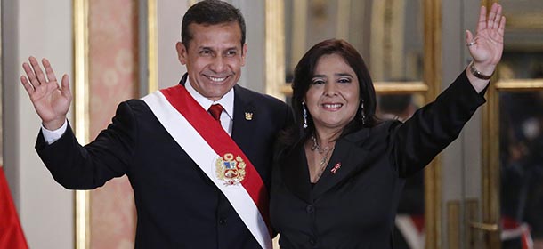 Peruvian President Ollanta Humala (L) waves with his new Prime Minister Ana Jara --outgoing Minister of Labour-- during the swearing-in ceremony in Lima on July 22, 2014. AFP PHOTO (Photo credit should read STR/AFP/Getty Images)
