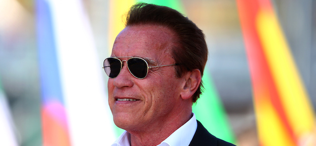 MELBOURNE, AUSTRALIA - MARCH 15: Actor Arnold Schwarzenegger looks on during the national anthem on the grid before the Australian Formula One Grand Prix at Albert Park on March 15, 2015 in Melbourne, Australia. (Photo by Mark Thompson/Getty Images)