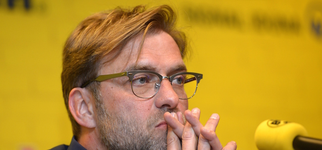 Dortmund's head coach Juergen Klopp attends a press conference on April 15, 2015 in Dortmund, western Germany, to announce that he will step down as coach of German first division Bundesliga football club Borussia Dortmund (BVB). Klopp will quit as head coach at the end of the season after seven years in charge and two German league titles. AFP PHOTO / SASCHA SCHUERMANN (Photo credit should read SASCHA SCHUERMANN/AFP/Getty Images)