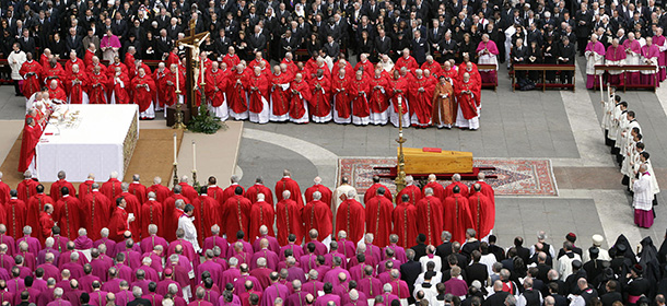 VATICAN CITY, Vatican: German Cardinal Joseph Ratzinger presides the funeral mass for Pope John Paul II in St Peter's Square at the Vatican City 08 April 2005. The world looked on Rome as leaders from more than 100 nations and a multitude of mourners gathered for the funeral Friday of Pope John Paul II, one of the most cherished pontiffs in history. AFP PHOTO PATRICK HERTZOG (Photo credit should read PATRICK HERTZOG/AFP/Getty Images)