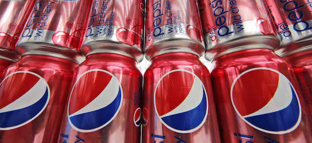 This Feb. 7, 2012 photo, shows cans Diet Pepsi Wild Cherry at a store in Pittsburgh. PepsiCo said Thursday, Feb. 9, 2012, it will cut 8.700 jobs in a cost-cutting move as it increases investment in advertising and marketing in North America. (AP Photo/Gene J. Puskar)