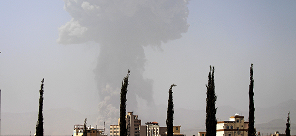 Smoke rises after a Saudi-led airstrike hit a site where many believe the largest weapons cache in Yemen's capital, Sanaa, is located on Monday, April 20, 2015. Powerful explosions rocked the Yemeni capital early Monday morning amid the strike, shattering windows and waking residents up. (AP Photo/Hani Mohammed)