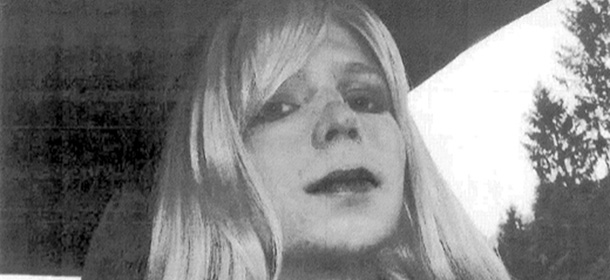 FILE - In this undated file photo provided by the U.S. Army, Pfc. Chelsea Manning poses for a photo wearing a wig and lipstick. Defense Department officials say hormone treatment for gender reassignment has been approved for Chelsea Manning, the former intelligence analyst convicted of espionage for sending classified documents to the WikiLeaks website. (AP Photo/U.S. Army, File)
