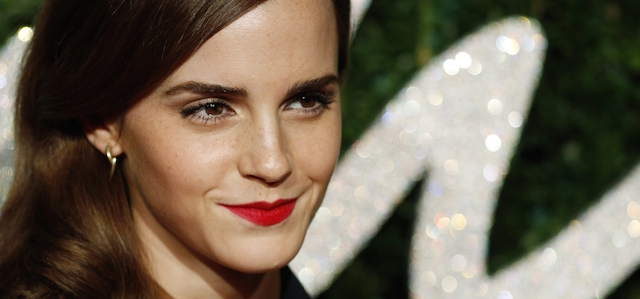 English actress Emma Watson poses for pictures on the red carpet upon arrival to attend the British Fashion Awards 2014 in London on December 1, 2014. AFP PHOTO/JUSTIN TALLIS (Photo credit should read JUSTIN TALLIS/AFP/Getty Images)