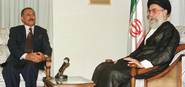 Iranian supreme leader Ali Khamenei (R) meets Yemeni president Ali Abdullah Saleh (L) in Tehran 18 April 2000. Saleh is on a three-day state visit to the Islamic Republic. 
 (Photo credit should read ATTA KENARE/AFP/Getty Images)