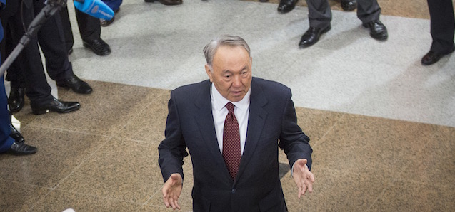 Kazakhstan's President and the main presidential candidate Nursultan Nazarbayev answers a question while speaking to workers during the opening of the "Moscow" subway station of the Almaty metro system in Almaty, Kazakhstan, Saturday, April 18, 2015. Presidential elections will be held in Kazakhstan on Sunday, April 26, 2015.(AP Photo/Pavel Mikheyev)
