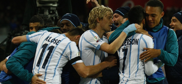 Lazio's players celebrate after scoring during the Italian Tim Cup semifinal second leg football match SSC Napoli vs SS Lazio on April 8, 2015 at the San Paolo stadium in Naples. AFP PHOTO / CARLO HERMANN (Photo credit should read CARLO HERMANN/AFP/Getty Images)