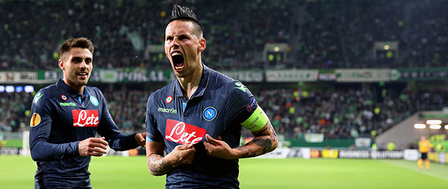 Napoli's Slovakian midfielder Marek Hamsik (R) celebrates after scoring his team's second goal with his team-mates during the UEFA Europa League first-leg quarter-final football match VfL Wolfsburg v SSC Napoli in Wolfsburg on April 16, 2015. AFP PHOTO / RONNY HARTMANN (Photo credit should read RONNY HARTMANN/AFP/Getty Images)