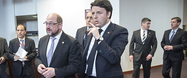 (L-R) Martin Schulz , the president of the European Parliament , Italian Prime Minister Matteo Renzi arrive for the family pictures during the European Summit of Heads of States and governments at the EU Council headquarters in Brussels, Belgium on 12.02.2015 The EU summit started two hours later than planned, after two of its participants - German Chancellor Angela Merkel and French President Francois Hollande - spent all night negotiating a Ukraine truce deal in Minsk. The European Union leaders are meeting to discuss Greece's economic crisis, EU counterterrorism efforts and the situation in Ukraine. by Wiktor Dabkowski Photo by: Wiktor Dabkowski/picture-alliance/dpa/AP Images