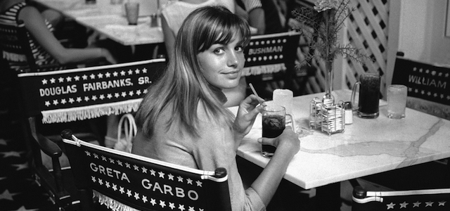 Visiting the Movieland Wax Museum and Palace of Living Art, European actress Catherine Spaak, relaxes and enjoys refreshments in the restaurant of the museum in Buena Park, California on Sept. 22, 1966. She relaxes in a deck chair of the type used by stars on the set that bear the name of film greats such as Greta Garbo. Miss Spaak recently finished her first Hollywood movie, ìHotelî where she plays the enigmatic French mistress of an unscrupulous businessman. Her co-star in the eight-year production, include Rod Taylor, Merle Oberon, Karl Malden, Melvyn Douglas, Richard Conte, Michael Rennie and Kevin McCarthy. (AP Photo/GB)