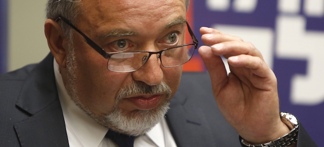 Israeli Foreign Minister Avigdor Lieberman gestures during a press conference at the Knesset in Jerusalem on May 4, 2015, announcing his Yisrael Beitenu party would not be joining the coalition government being formed by Prime Minister Benjamin Netanyahu. The surprise announcement came just two days before a deadline for Netanyahu to present his new government, which he had hoped would be a rightwing religious lineup with a majority of 67 of the parliament's 120 seats. AFP PHOTO / GALI TIBBON (Photo credit should read GALI TIBBON/AFP/Getty Images)