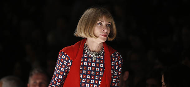 British editor-in-chief of American Vogue Anna Wintour attends a Max Mara women's spring-summer 2015 collection, part of the Milan Fashion Week, unveiled in Milan, Italy, Thursday, Sept. 18, 2014. (AP Photo/Luca Bruno)