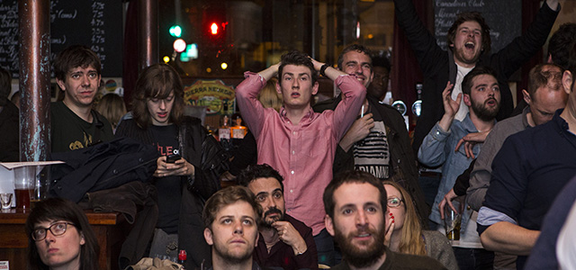 People react as a result is announced at a screening at a pub in North London on May 8, 2015. Prime Minister David Cameron's Conservatives are on course to be the biggest party in the next British parliament, according to an exit poll from the general election on Thursday showing them winning far more seats than had been expected. The projected result of 316 seats would beat centre-left Labour on 239 seats, upsetting analyst predictions of a neck-and-neck contest between Cameron and Labour challenger Ed Miliband. AFP PHOTO / JACK TAYLOR (Photo credit should read JACK TAYLOR/AFP/Getty Images)