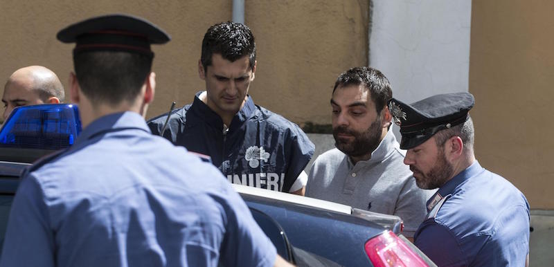 L'ex consigliere regionale del Lazio di Forza Italia Luca Gramazio durante l'arresto di oggi (ANSA/MASSIMO PERCOSSI)