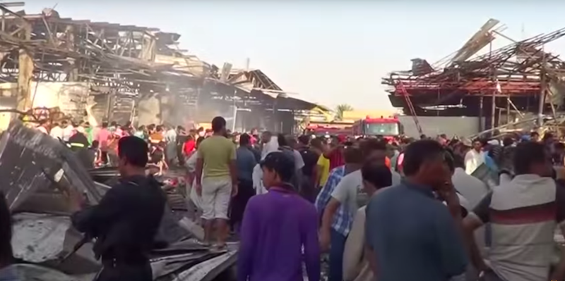 Il mercato di Sadr City dopo l'esplosione. Baghdad, Iraq. 