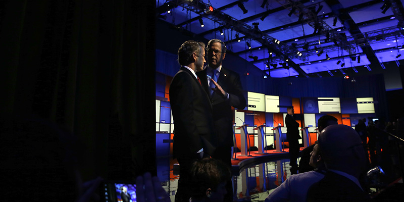Jeb Bush e Rand Paul. (AP Photo/Chris Carlson)