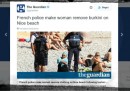 Le foto dei poliziotti francesi che multano una donna musulmana sulla spiaggia di Nizza