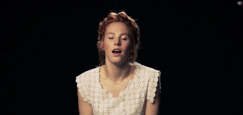 Un fotogramma del video di "Go to go", in cui tre cantanti cercano di cantare mentre si masturbano