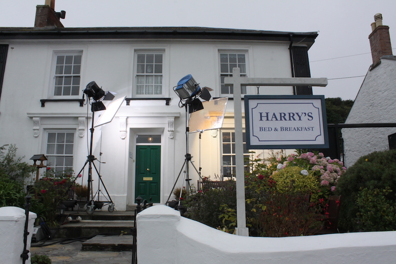 The private house in Portscatho, which turns into 'Harry's Bed &amp; Breakfast' in the series, is illuminated by headlights for the production works for the Rosamunde Pilcher series of ZDF television in Cornwall, England, 12 September 2016. PHOTO: PHILIP DETHLEFS/dpa